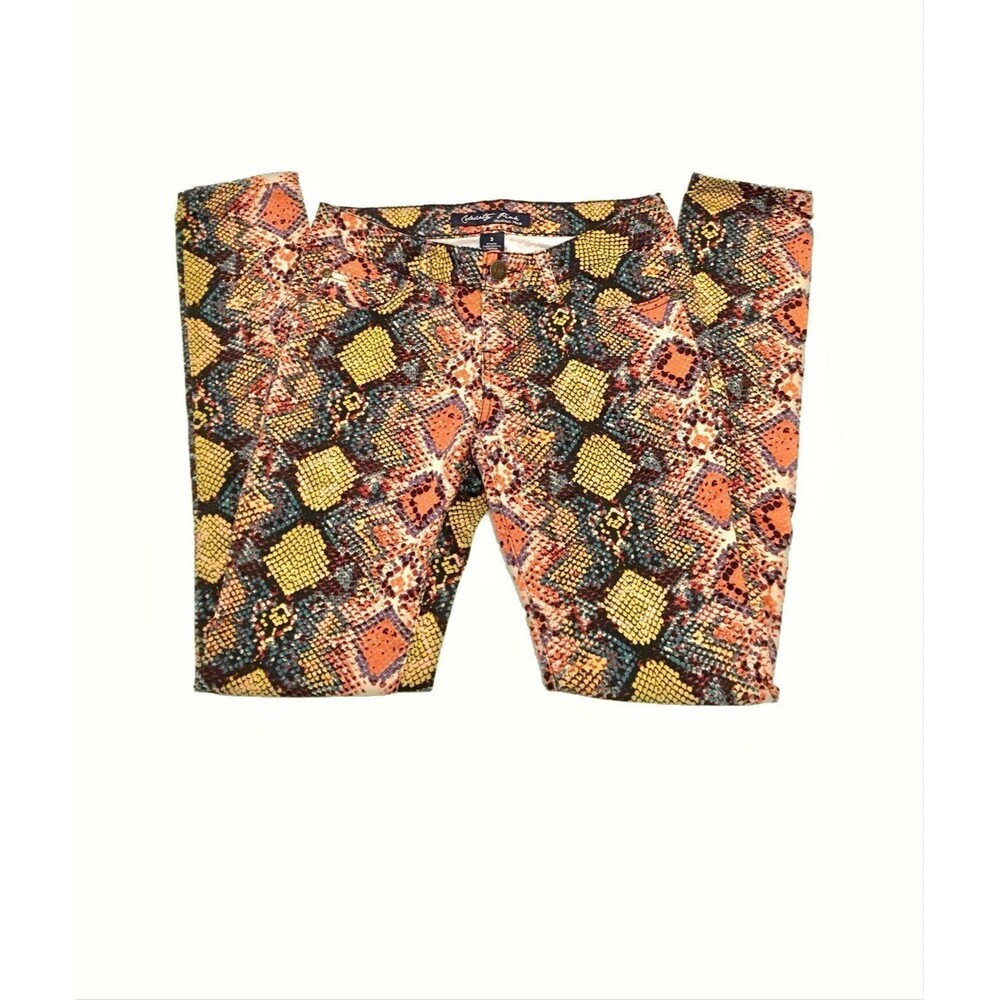 Multi colored lizard print jeans. Juniors size 3